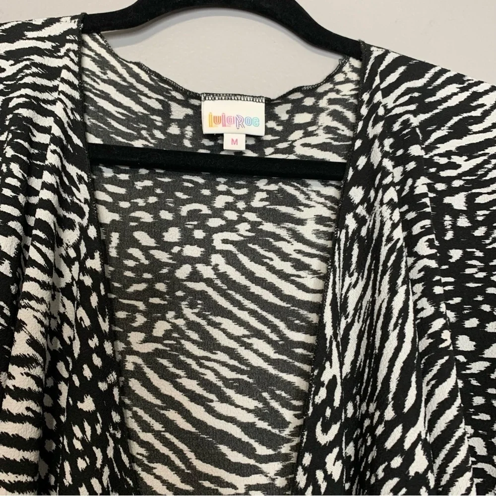LulaRoe black‎ and white zebra stripe draped Jacket. Size M
